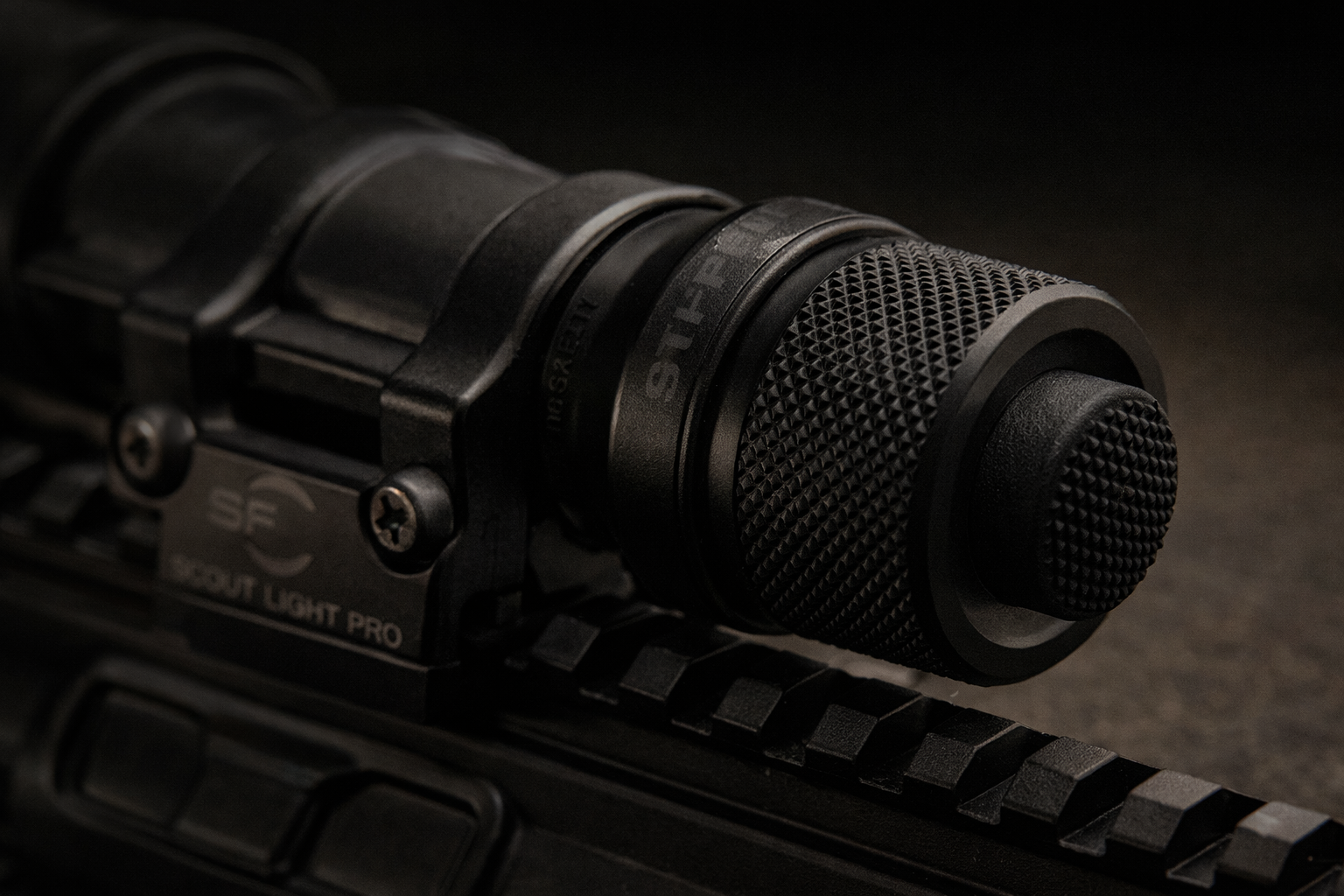 M340DFT Turbo review close-up of tailcap control and Scout Light Pro mount hardware