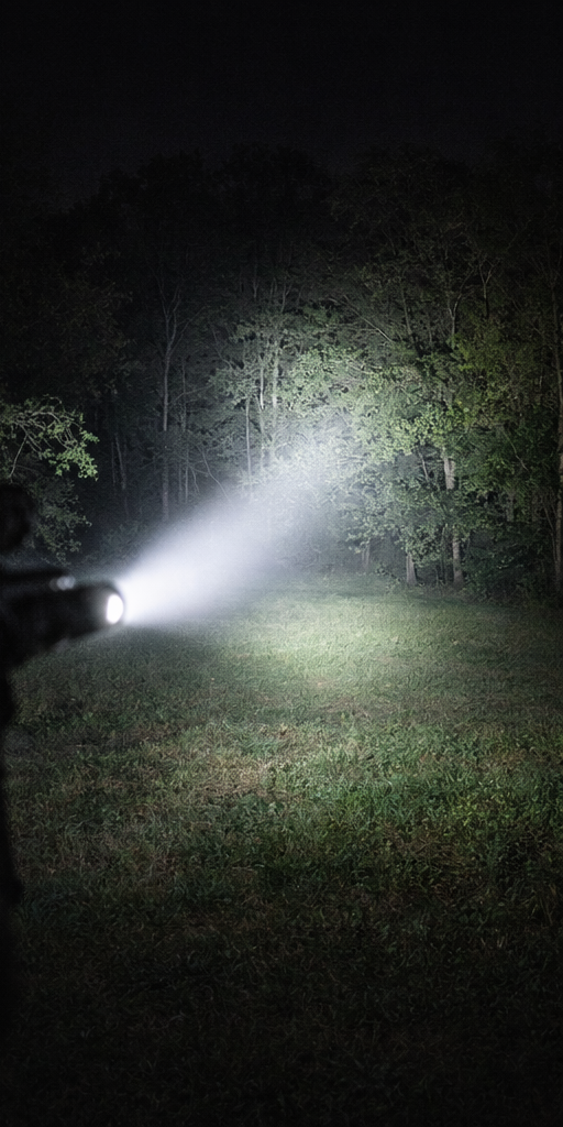 <img src="outdoor-candela-throw.png" alt="high candela rifle light beam for outdoor distance identification at night">