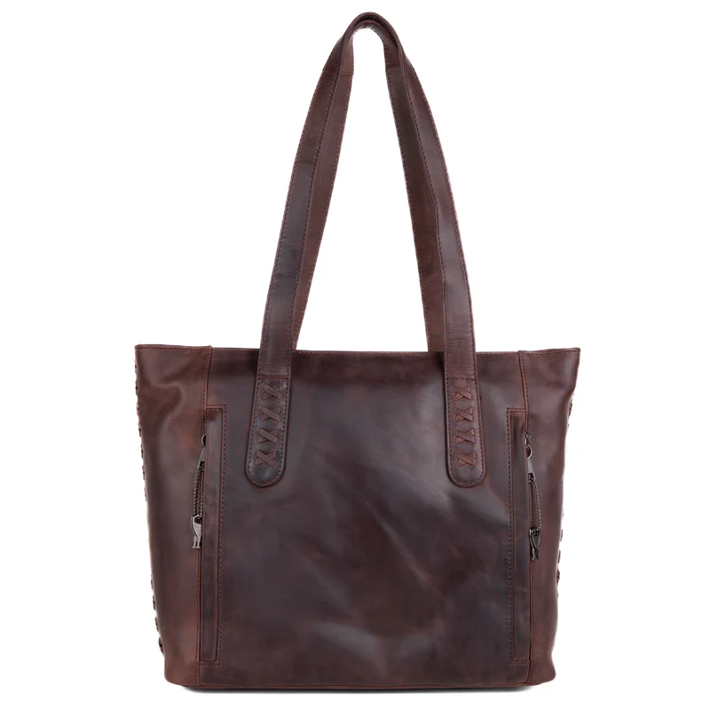 Back view of Norah tote showing dual vertical zipper access points for concealed carry compartment