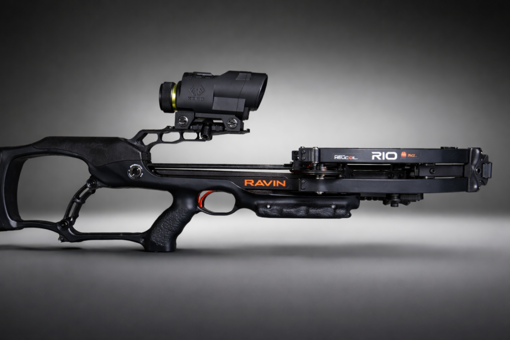 Ravin crossbow with Ravin Integrated Xero X1i scope mounted, studio lighting, gray background