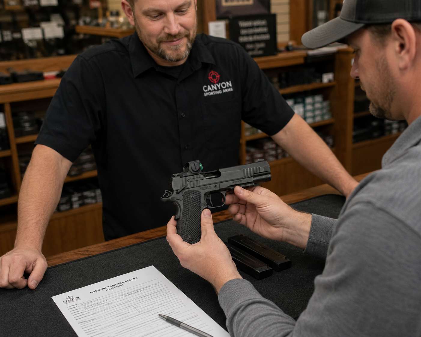 Buyer inspecting a SIG 1911-X style pistol safely at an FFL transfer counter